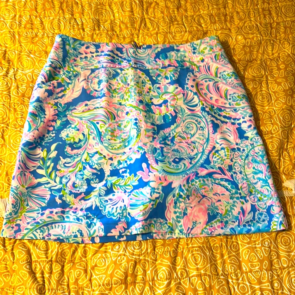 New Without Tag, never worn. Has pockets, and is a skort.
